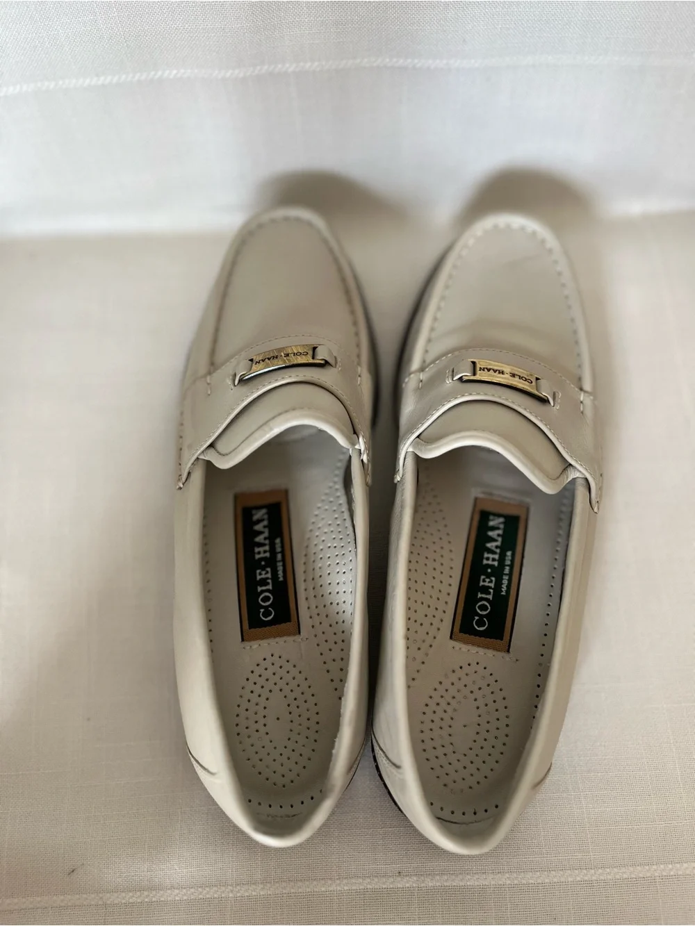 Cole Haan Cream Leather Penny Loafers with Gold Plaque